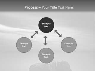 A Black And White Photo Of A Rock In The Ocean PowerPoint Template