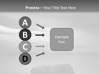 A Black And White Photo Of A Rock In The Ocean PowerPoint Template