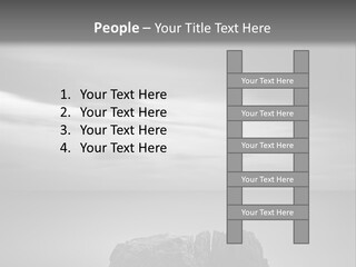A Black And White Photo Of A Rock In The Ocean PowerPoint Template