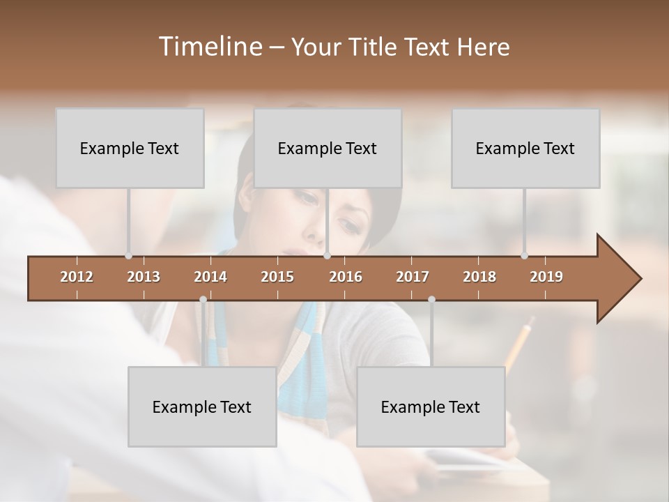 A Woman Sitting At A Desk With A Man PowerPoint Template