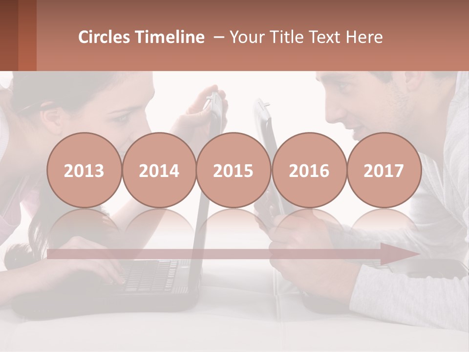 A Man And Woman Looking At A Laptop Screen PowerPoint Template