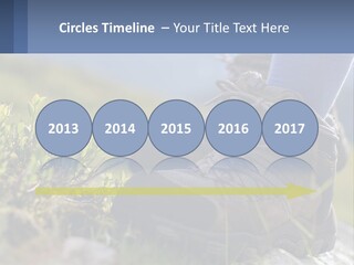 A Person In Hiking Boots Standing On A Rock PowerPoint Template