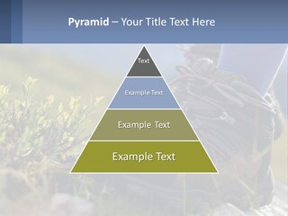 A Person In Hiking Boots Standing On A Rock PowerPoint Template