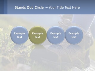 A Person In Hiking Boots Standing On A Rock PowerPoint Template