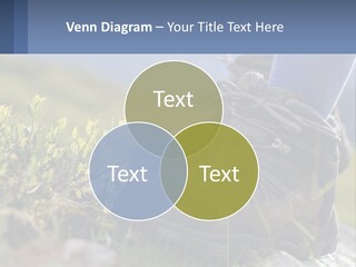 A Person In Hiking Boots Standing On A Rock PowerPoint Template