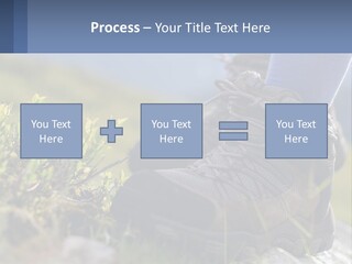 A Person In Hiking Boots Standing On A Rock PowerPoint Template