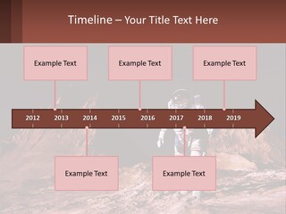 A Man In An Astronaut Suit Walking On A Rocky Surface With Mountains In The Background PowerPoint Template