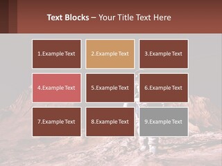 A Man In An Astronaut Suit Walking On A Rocky Surface With Mountains In The Background PowerPoint Template