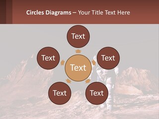 A Man In An Astronaut Suit Walking On A Rocky Surface With Mountains In The Background PowerPoint Template