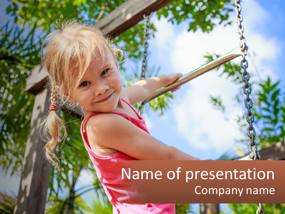 A Little Girl Is Swinging On A Swing PowerPoint Template