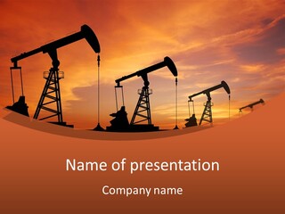 A Group Of Oil Pumps With A Sunset In The Background PowerPoint Template