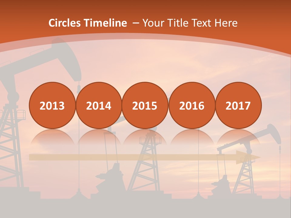 A Group Of Oil Pumps With A Sunset In The Background PowerPoint Template