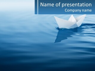 A Paper Boat Floating On Top Of A Body Of Water PowerPoint Template