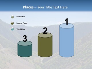 A Scenic View Of Mountains With A Road Going Through Them PowerPoint Template