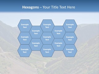 A Scenic View Of Mountains With A Road Going Through Them PowerPoint Template