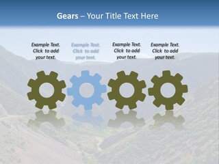 A Scenic View Of Mountains With A Road Going Through Them PowerPoint Template