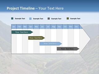 A Scenic View Of Mountains With A Road Going Through Them PowerPoint Template