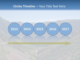 A Scenic View Of Mountains With A Road Going Through Them PowerPoint Template