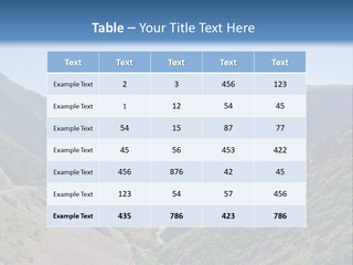 A Scenic View Of Mountains With A Road Going Through Them PowerPoint Template
