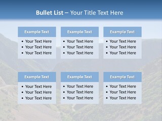 A Scenic View Of Mountains With A Road Going Through Them PowerPoint Template