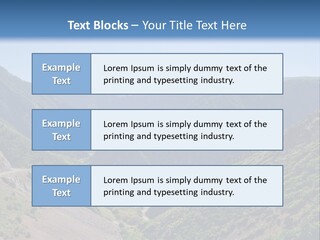 A Scenic View Of Mountains With A Road Going Through Them PowerPoint Template