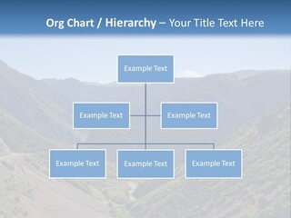 A Scenic View Of Mountains With A Road Going Through Them PowerPoint Template