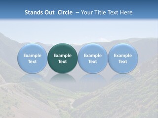 A Scenic View Of Mountains With A Road Going Through Them PowerPoint Template