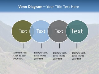 A Scenic View Of Mountains With A Road Going Through Them PowerPoint Template