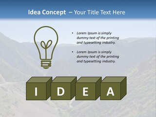A Scenic View Of Mountains With A Road Going Through Them PowerPoint Template