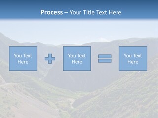 A Scenic View Of Mountains With A Road Going Through Them PowerPoint Template