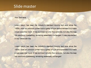 A Pile Of Gold Nuggets On A Table PowerPoint Template