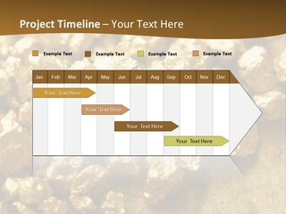 A Pile Of Gold Nuggets On A Table PowerPoint Template