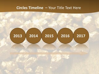 A Pile Of Gold Nuggets On A Table PowerPoint Template