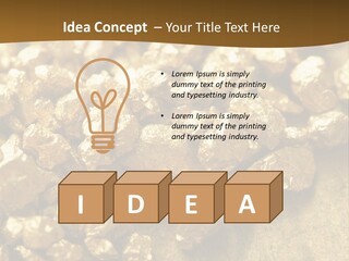 A Pile Of Gold Nuggets On A Table PowerPoint Template