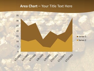 A Pile Of Gold Nuggets On A Table PowerPoint Template
