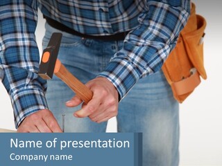 A Person Holding A Hammer And A Piece Of Wood PowerPoint Template