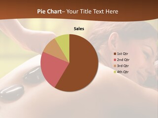 A Woman Getting A Hot Stone Massage At A Spa PowerPoint Template