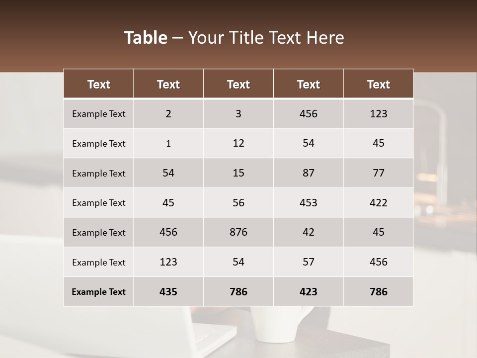 A Woman Sitting At A Table Using A Laptop Computer PowerPoint Template