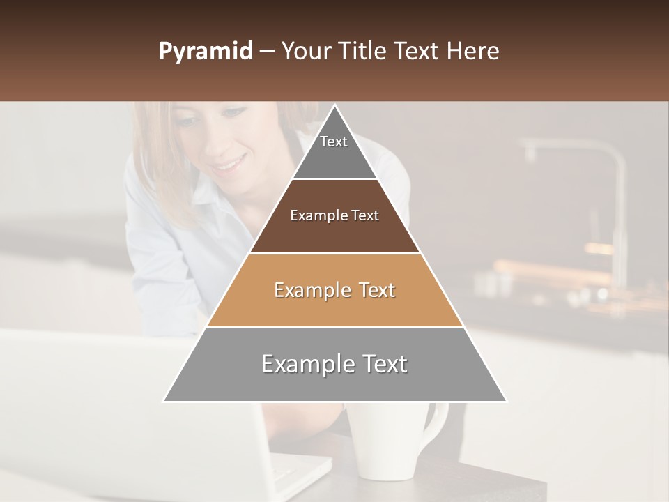 A Woman Sitting At A Table Using A Laptop Computer PowerPoint Template