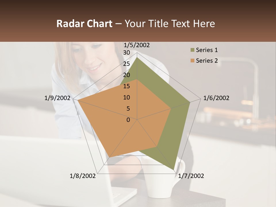 A Woman Sitting At A Table Using A Laptop Computer PowerPoint Template