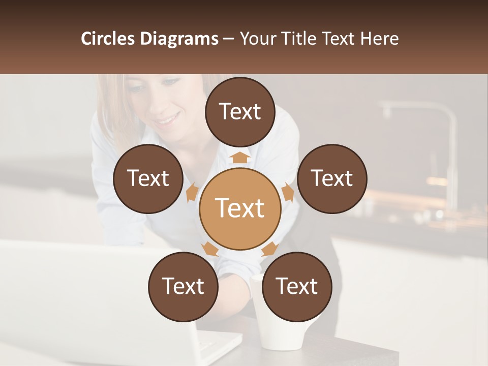 A Woman Sitting At A Table Using A Laptop Computer PowerPoint Template