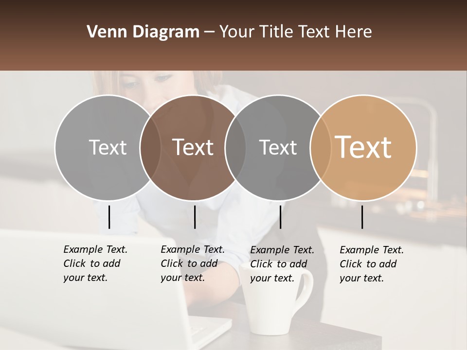 A Woman Sitting At A Table Using A Laptop Computer PowerPoint Template
