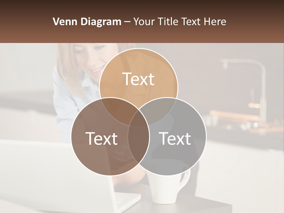 A Woman Sitting At A Table Using A Laptop Computer PowerPoint Template