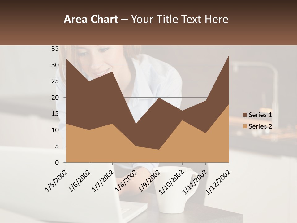 A Woman Sitting At A Table Using A Laptop Computer PowerPoint Template