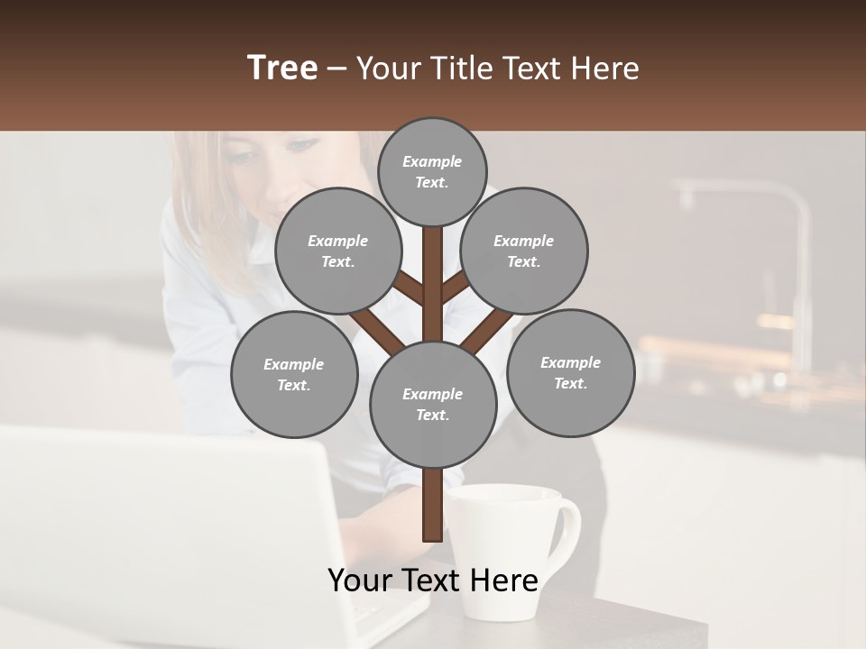 A Woman Sitting At A Table Using A Laptop Computer PowerPoint Template