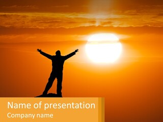 A Man Standing On Top Of A Hill With His Arms Outstretched PowerPoint Template