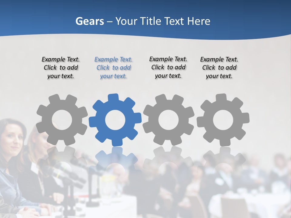 A Group Of People Sitting At A Table In Front Of Microphones PowerPoint Template