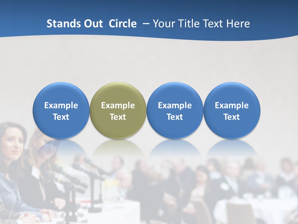 A Group Of People Sitting At A Table In Front Of Microphones PowerPoint Template