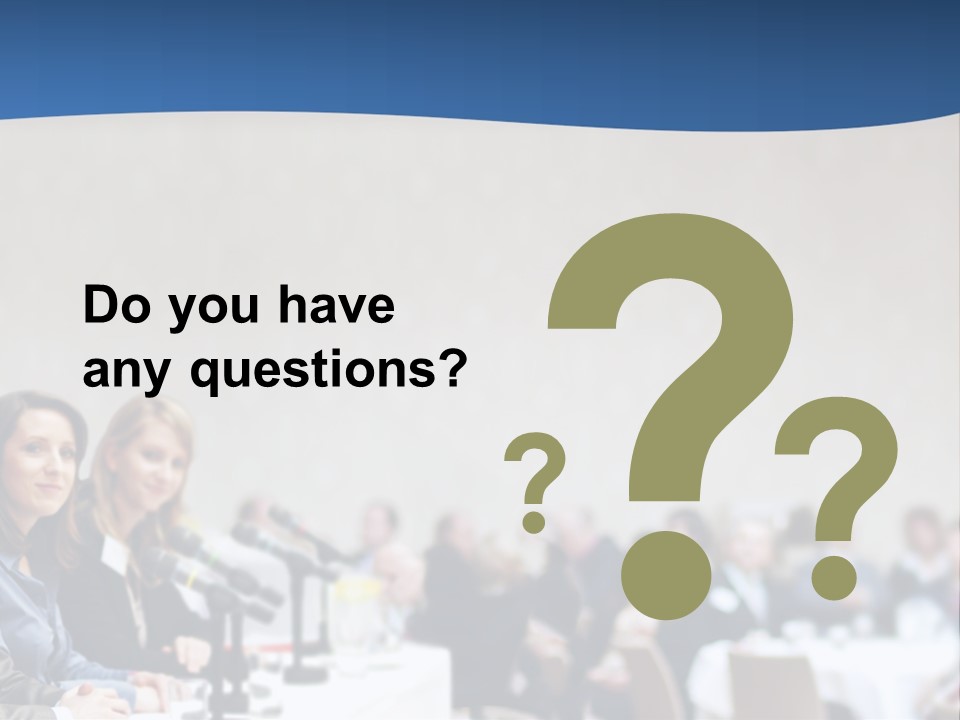 A Group Of People Sitting At A Table In Front Of Microphones PowerPoint Template