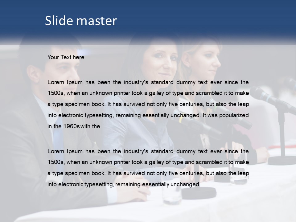 A Group Of People Sitting At A Table With Microphones PowerPoint Template